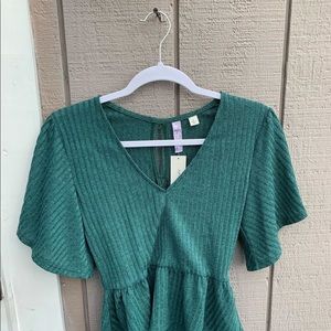 Francesca’s teal top